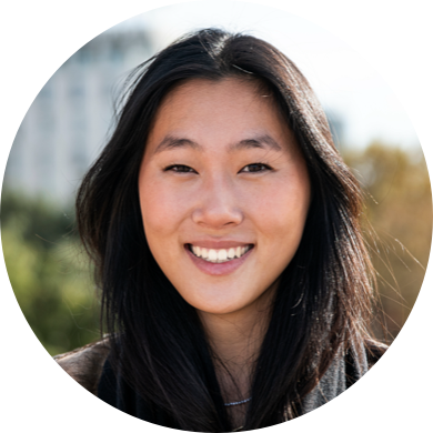 Laura, smiling woman with long dark hair, worker profile avatar